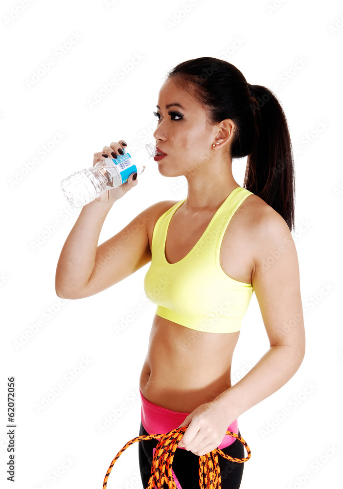 Exercise girl drinking water. Exercise girl drinking water.