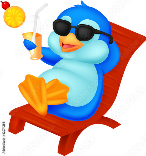 Cute penguin sitting on beach chair