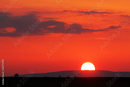Orange - red sunset over horizont