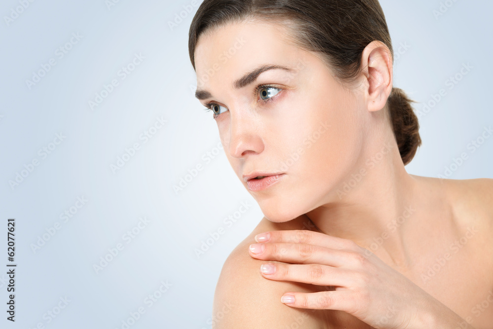 Portrait of Beautiful Young Woman posing in studio Portrait of Beautiful Young Woman posing in studio