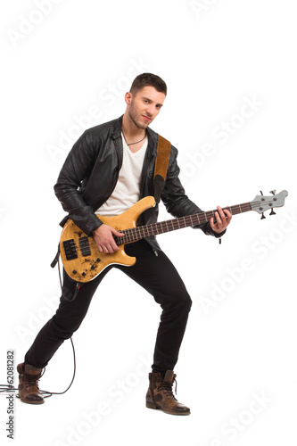 Male guitarist with bass guitar. photo