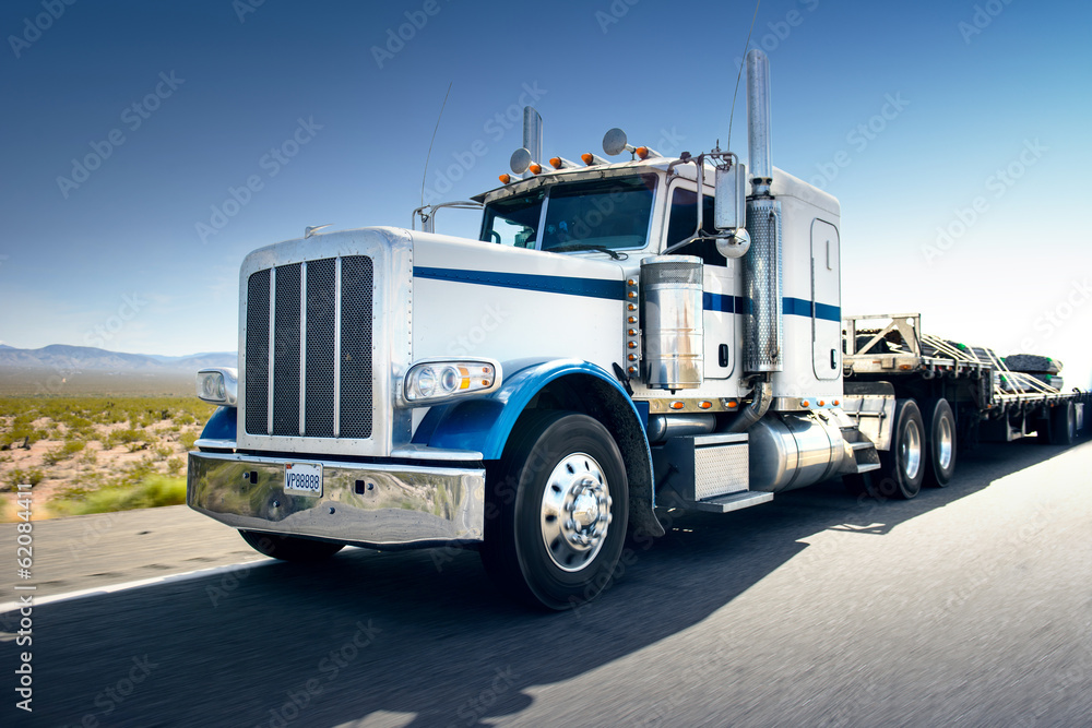 Truck and highway at day - transportation background