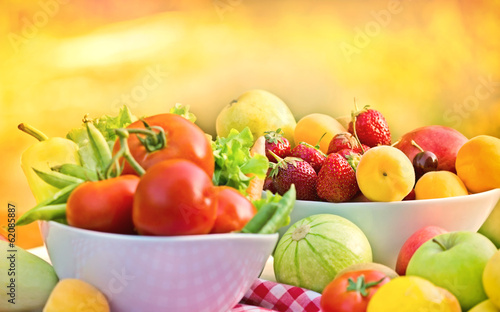 Organic fruits and vegetables in a bowls