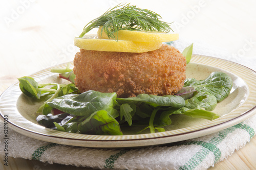 smoked haddock fishcake on salad