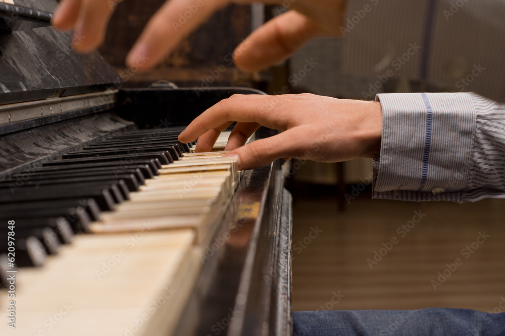 Fototapeta premium Concert pianist playing the piano