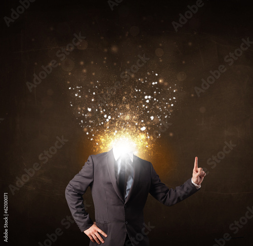 Business man with glowing exploding head