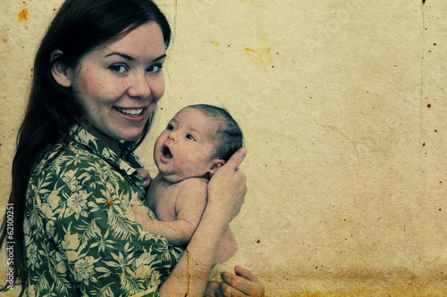 Cuadro en lienzo young mother with her baby. Photo in old image style