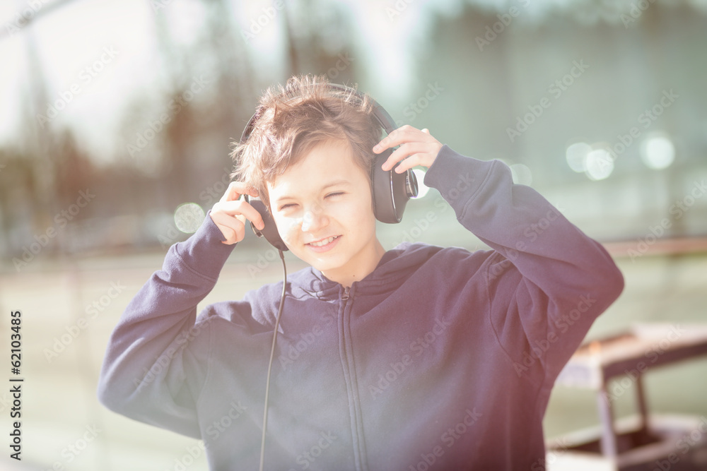 Young boy with headphones in vintage look