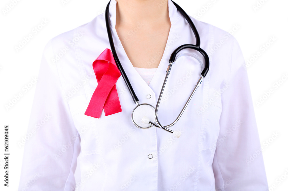 Doctor with ribbon formed Aids symbol, close-up, isolated Doctor with ribbon formed Aids symbol, close-up, isolated