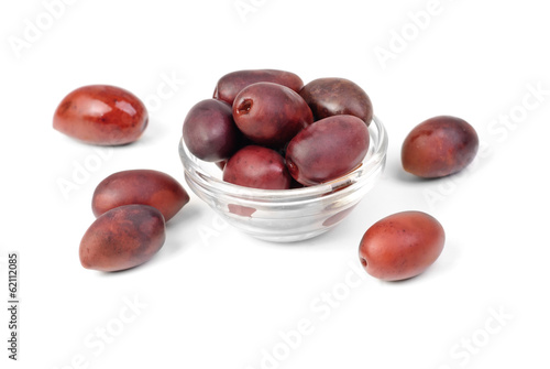 Kalamata olives in bowl isolated on white background