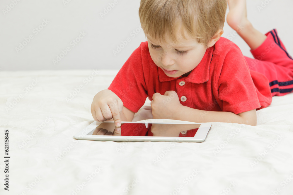 little boy with tablet