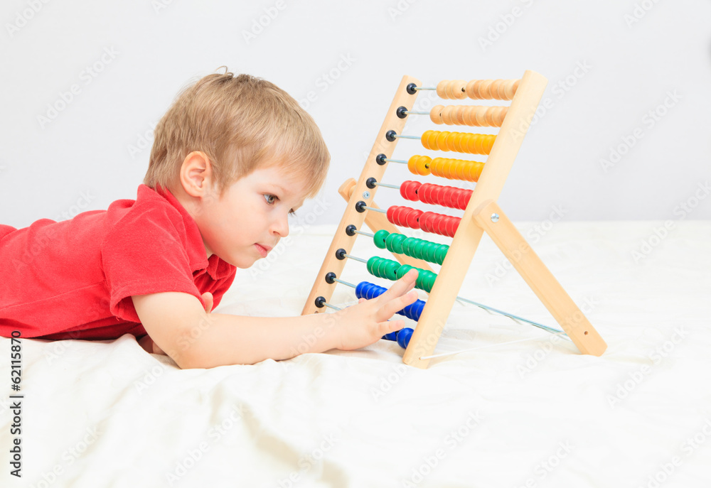 little boy playing with abacus, early learning little boy playing with abacus, early learning