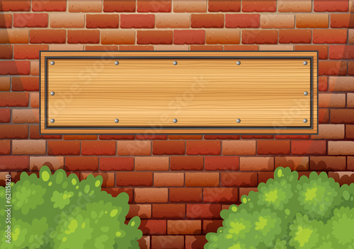 A stonewall with an empty signboard