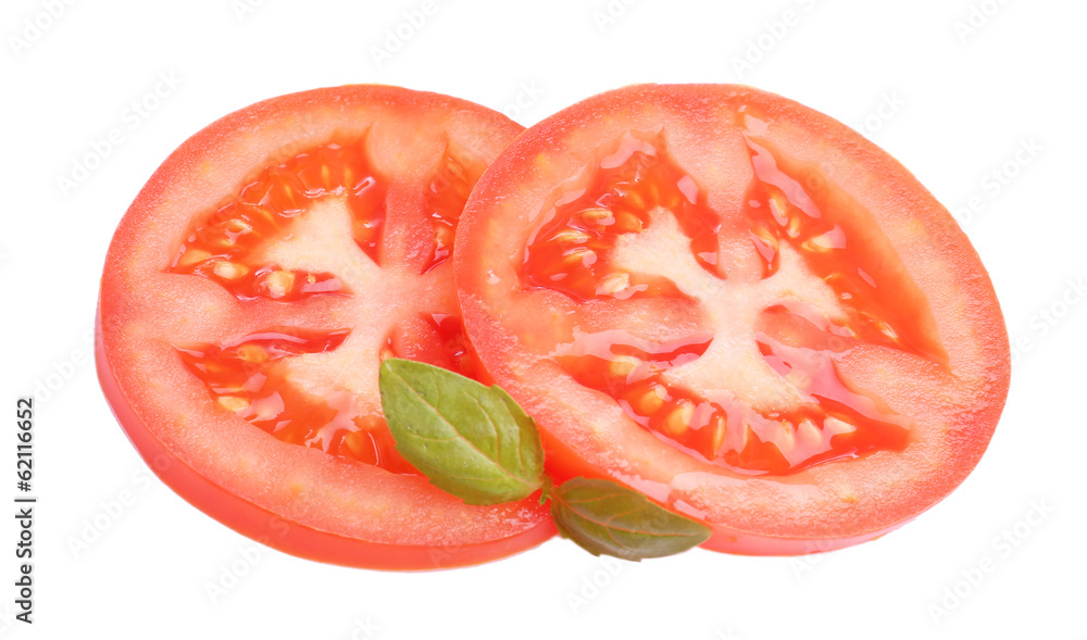 Slices of fresh tomato with basil, isolated on white Slices of fresh tomato with basil, isolated on white