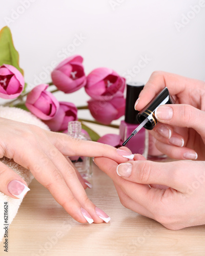 Fototapeta Naklejka Na Ścianę i Meble -  Manicure process in beauty salon close up