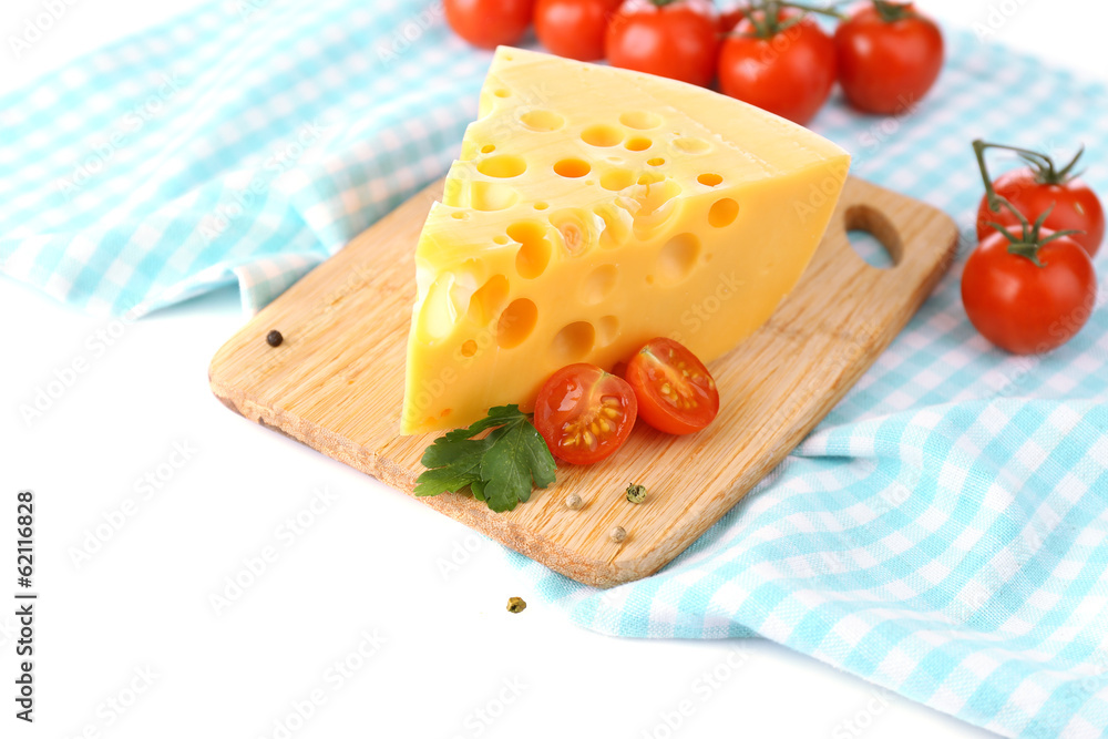 Piece of cheese and tomatoes, on wooden board, isolated on Piece of cheese and tomatoes, on wooden board, isolated on