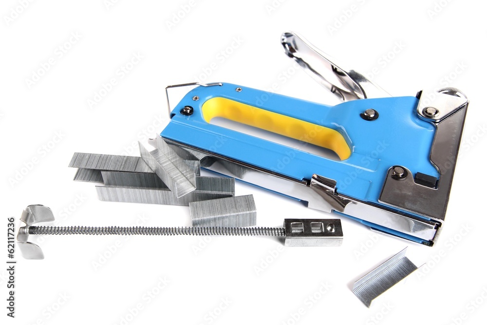 Construction stapler and staples isolated on white Construction stapler and staples isolated on white