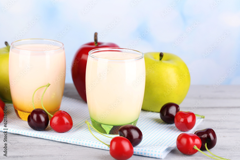 Delicious yogurt with fruits tastes in glasses and fresh fruits Delicious yogurt with fruits tastes in glasses and fresh fruits