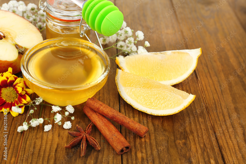 Sweet honey on wooden table Sweet honey on wooden table
