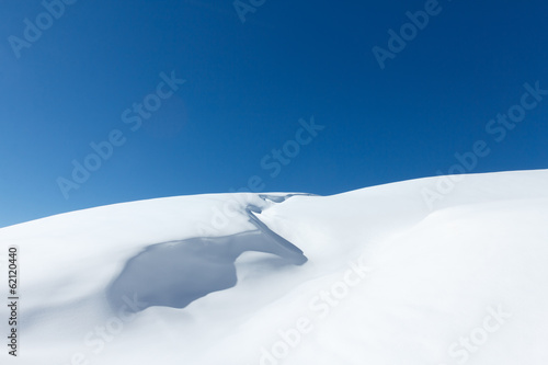 Valokuva Neige poudreuse et ciel bleu