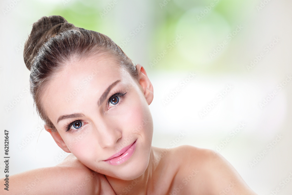 Naklejka premium portrait of young woman face