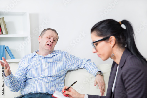Business man talking to his psychiatrist
