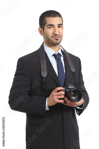 Arab professional photographer holding a dslr digital camera