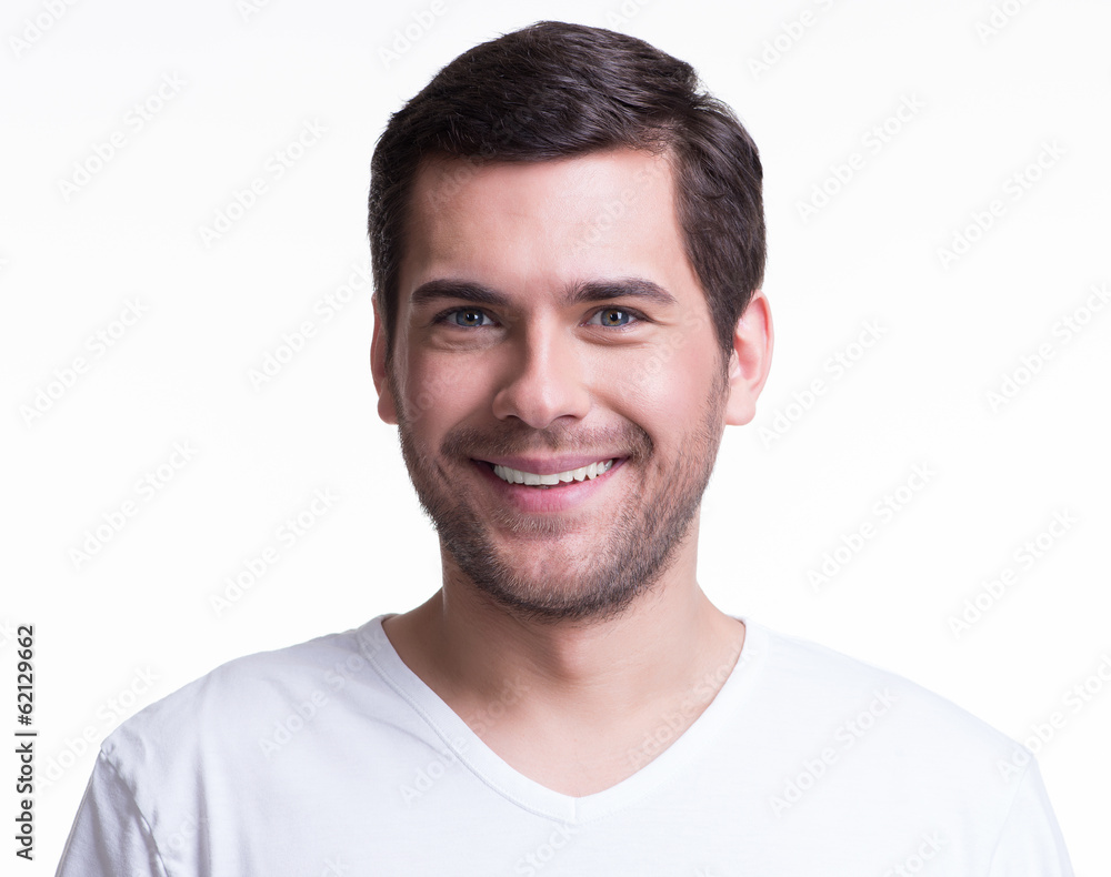 Portrait of smiling happy young man. Portrait of smiling happy young man.