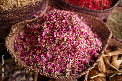 spices herbs flowers (rose) in the Marrakesh street souk shop