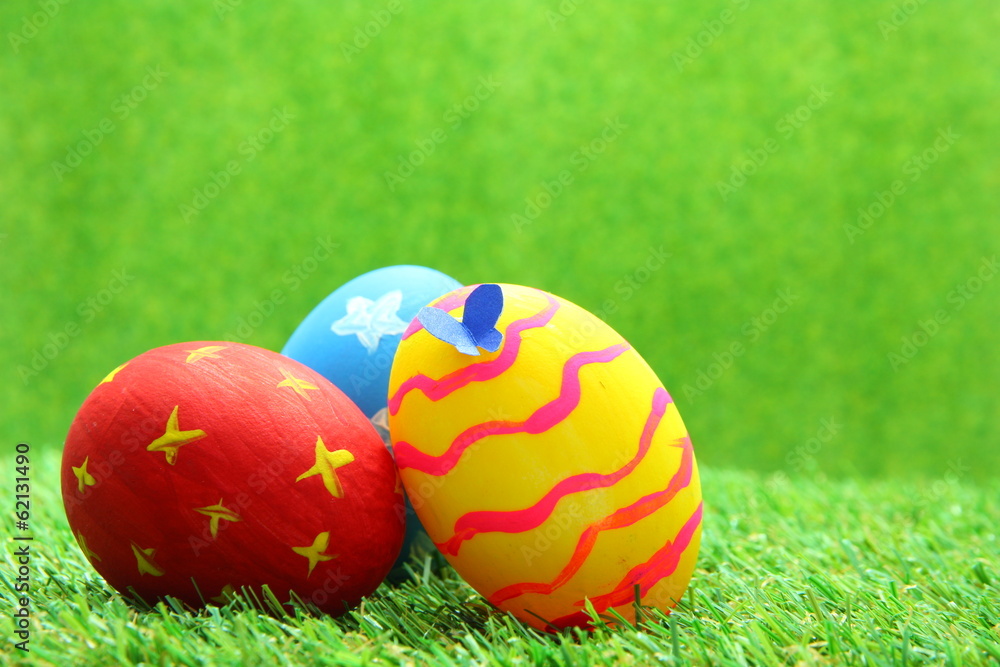 Easter eggs on grass background