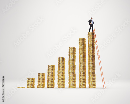 Businessman on the top of coin diagram
