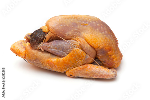 Guinea fowl on a white studio background.