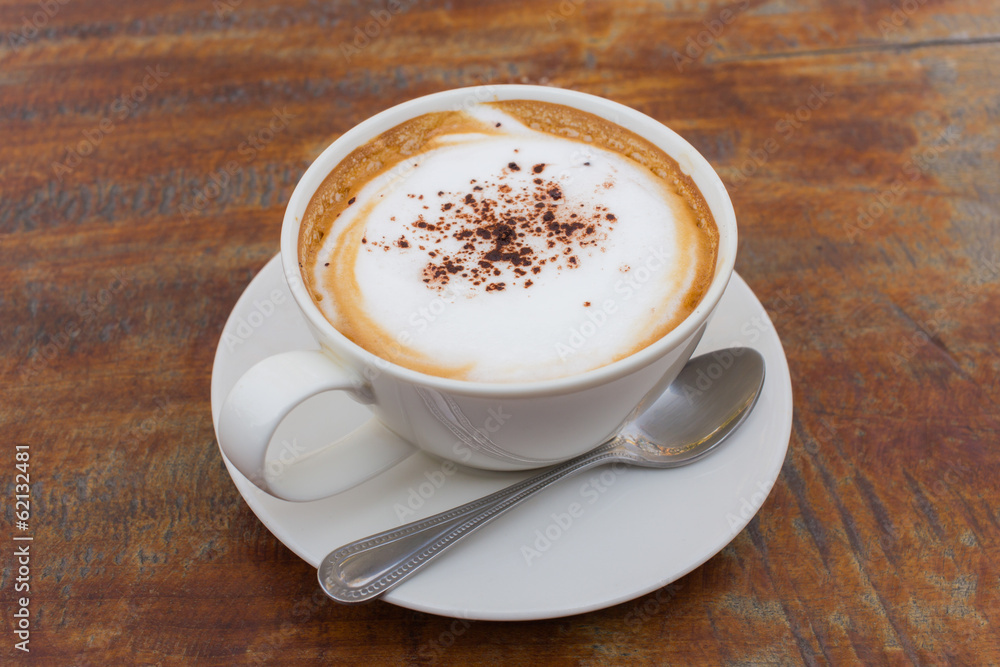 Hot Coffee cup on Wooden Table