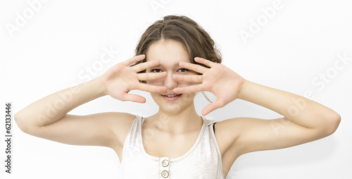 face of a young girl and her hands