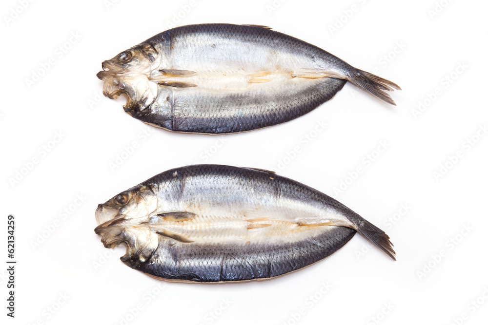 Kippers isolated on a white studio background. Kippers isolated on a white studio background.