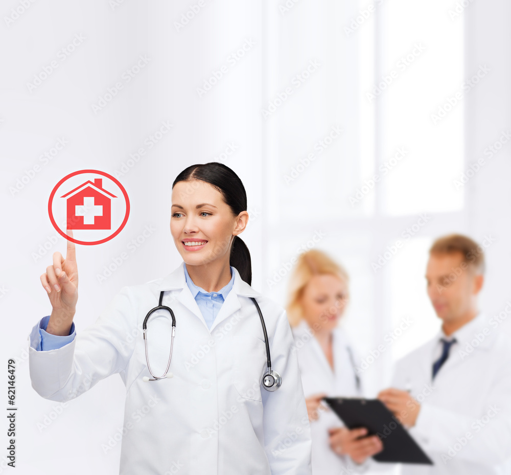 smiling female doctor pointing to something smiling female doctor pointing to something
