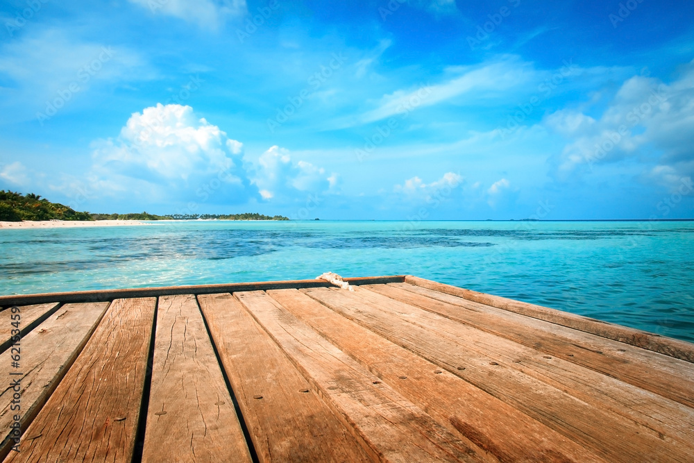 Jetty, beach and jungle - vacation background