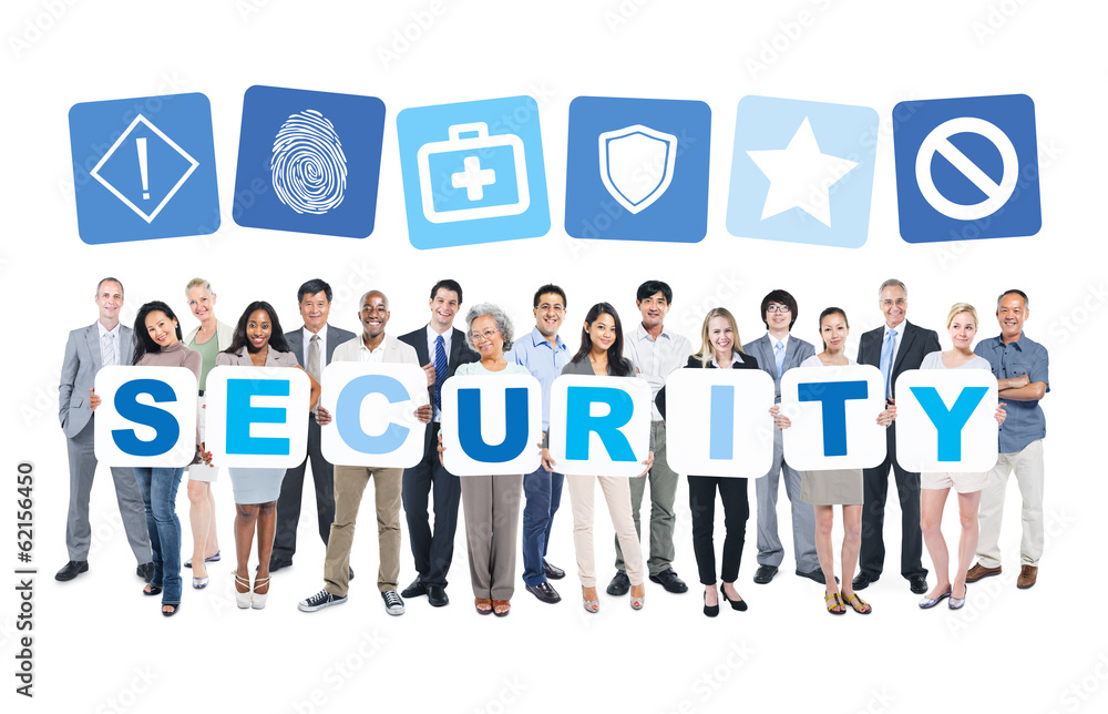 Multi-Ethnic Group Of People Holding The Word Security Multi-Ethnic Group Of People Holding The Word Security