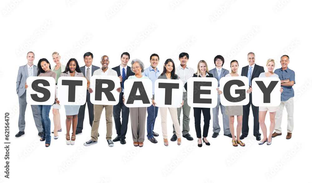 Multi-Ethnic Group Of People Holding The Word Strategy Multi-Ethnic Group Of People Holding The Word Strategy