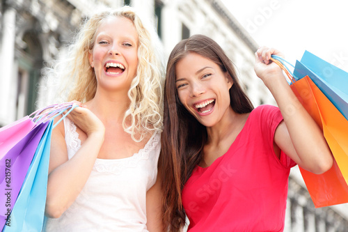 Friends shopping women excited and happy