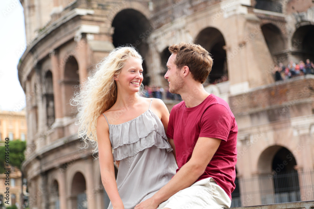 Travel couple in Rome by Coliseum in love