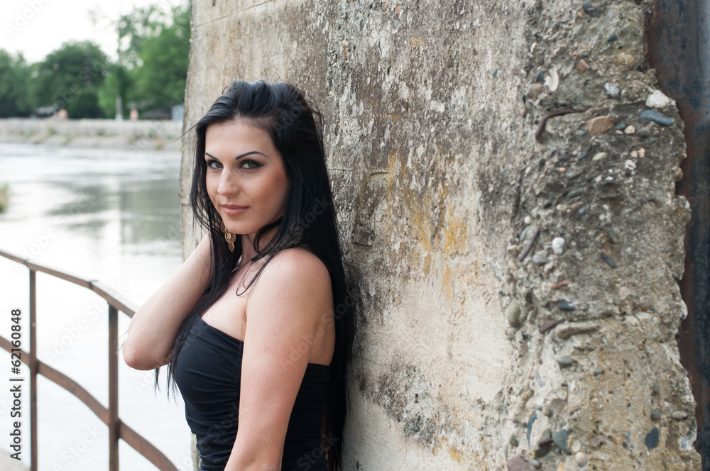 Fototapeta premium Young beautiful girl on a walk in the country