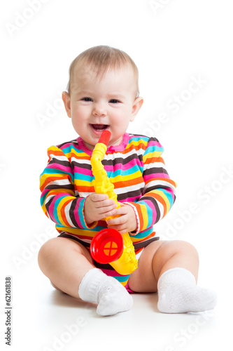 baby playing musical toy