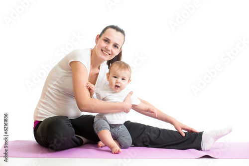 mom with baby doing gymnastics