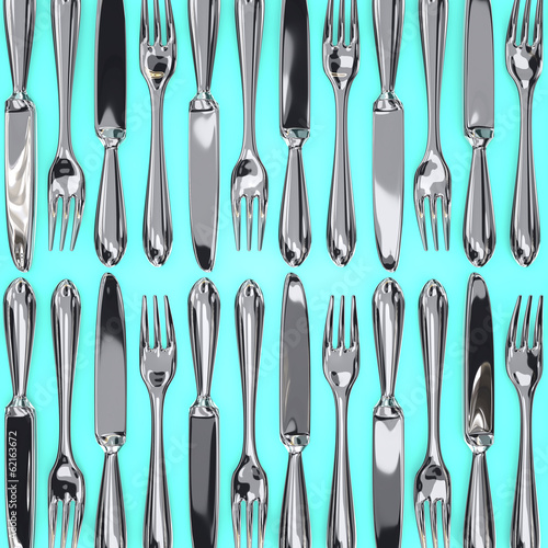 Top View Of Knives And Forks On Blue Background