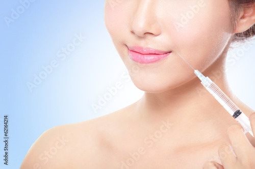 woman having an injection above the lips