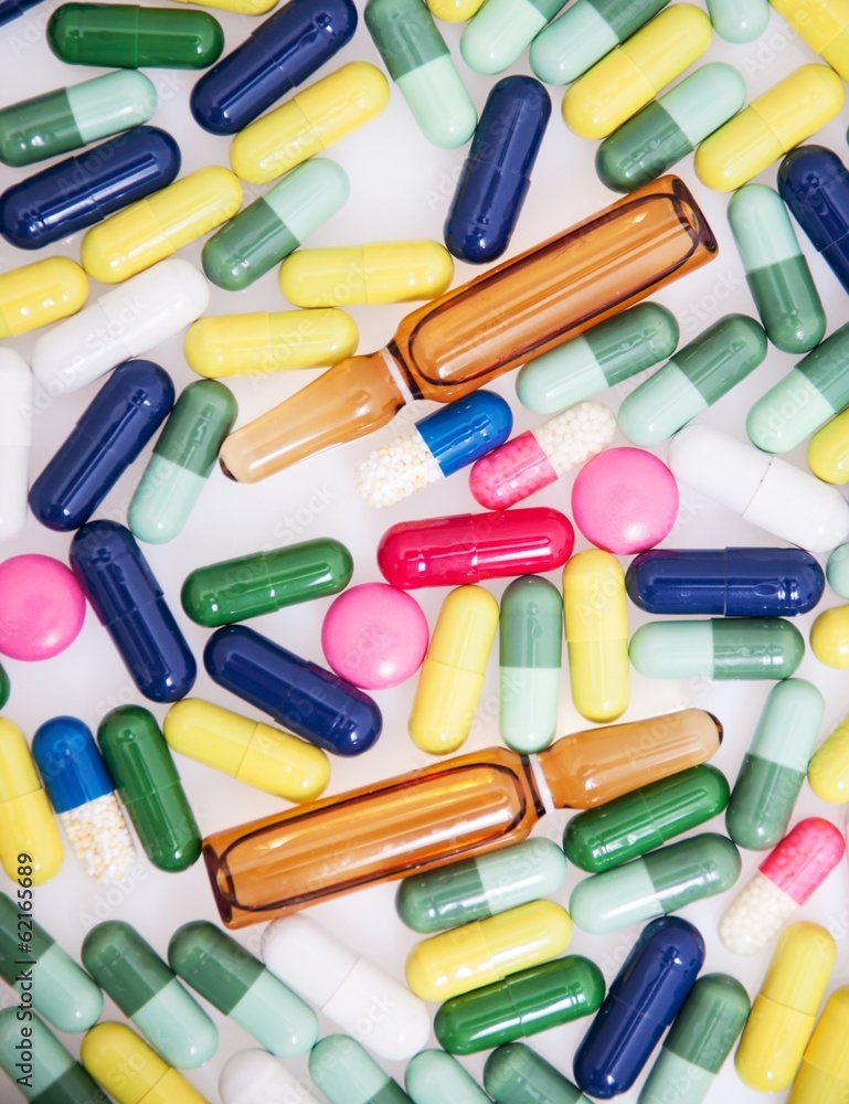 Detail of a pile of colorful medicine pills Detail of a pile of colorful medicine pills