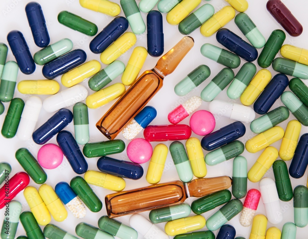 Detail a pile of colorful medicine pills Detail a pile of colorful medicine pills