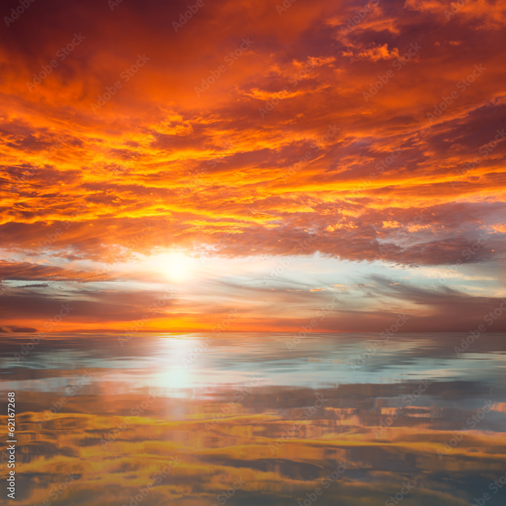 Fototapeta Reflection of Beautiful Sunset / Majestic Clouds and Sun above