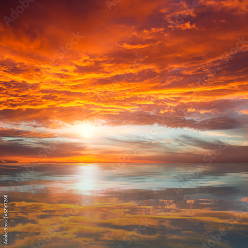 Reflection of Beautiful Sunset /  Majestic Clouds and Sun above © Taiga